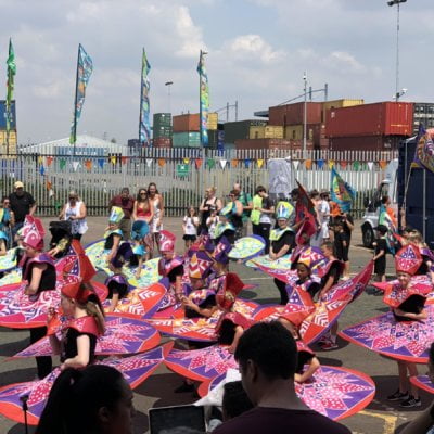 The Tilbury Carnival unveils Windrush stimulated flags to mark Windrush Day 2019