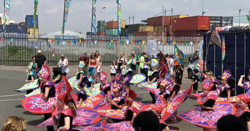 The Tilbury Carnival unveils Windrush stimulated flags to mark Windrush Day 2019