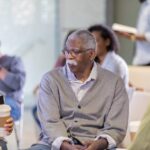 A picture containing person, indoor, people Description automatically generated