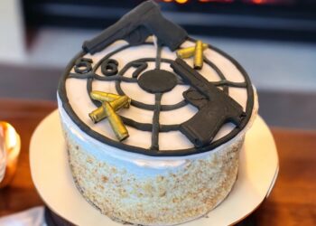 Man makes use of gun to reduce birthday cake through shooting it