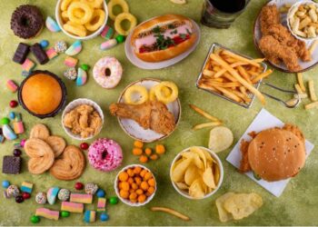 Person resists arrest in rapid food eating place automobile parking space