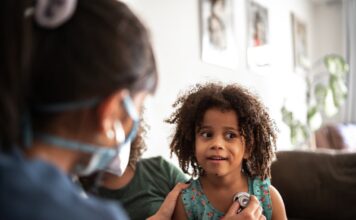 A picture containing person, indoor Description automatically generated