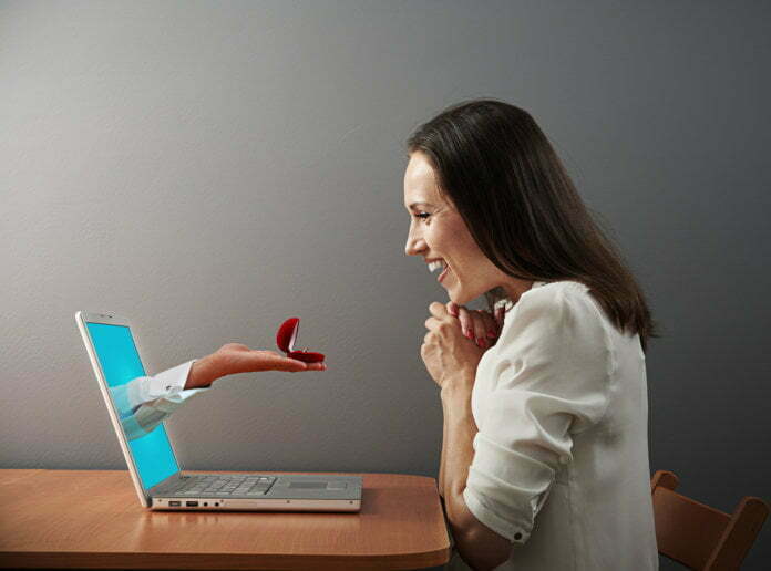 woman looking at ring