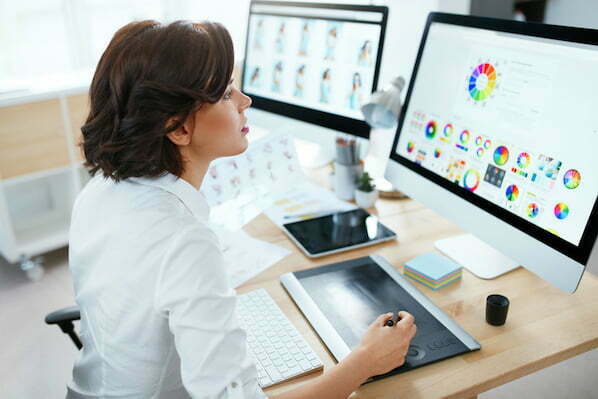 Web Designer Working On Computer
