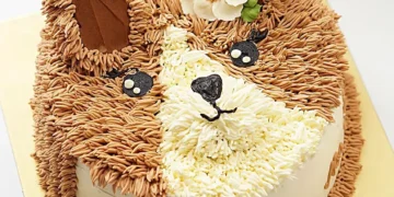 Man smashes cake in pet lion's face. Twitter asks who is the actual animal 5